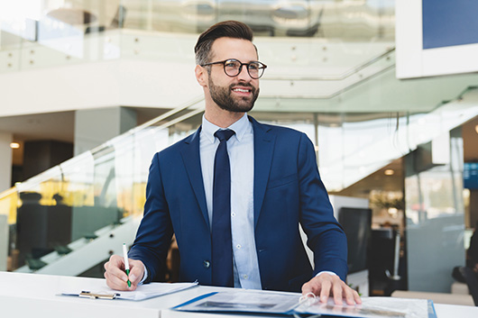 Image of a front desk representative at a vehicle registry