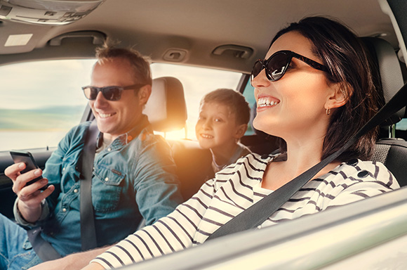 Image of a happy family, cruising in their new pre-owned from RightRide