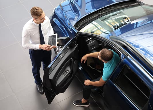 Client buying a vehicle at a bad credit dealership.