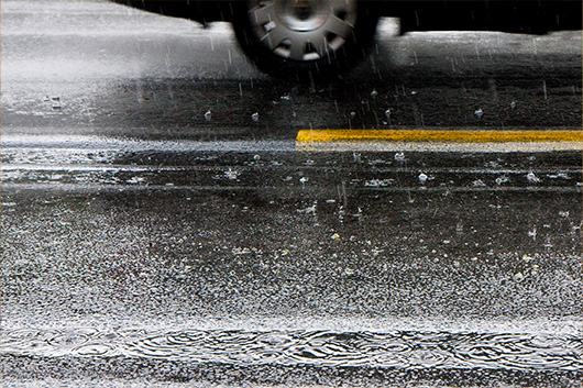 Image of a wet road that just got rained on