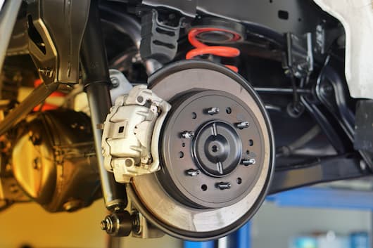 Image of a customer's braking system inside the mechanic shop.