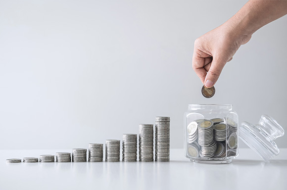 Image of coins stacking up to symbolize cost savings when you purchase from RightRide