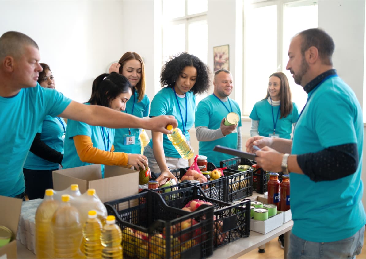 RightRide employees volunteering at a food bank.
