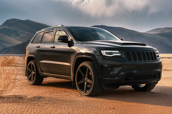 Image of a 2022 all black Jeep Cherokee SUV