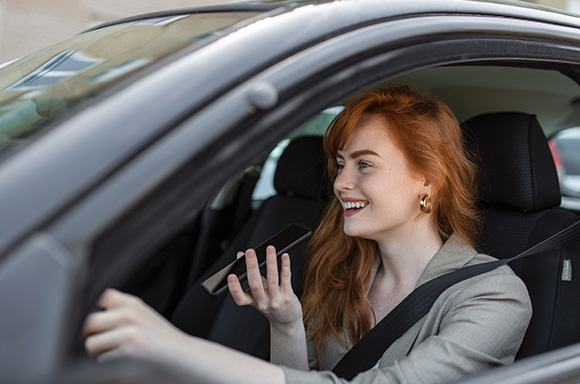 Customer using voice activated feature with their vehicle.